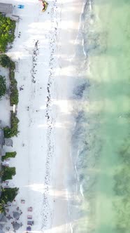 Vertical Video Boats in the Ocean Near the Coast of Zanzibar Tanzania