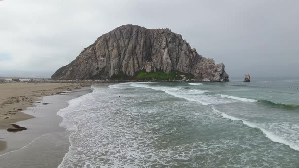 4K Aerial view of Morro Rock and Morro Bay in California USA