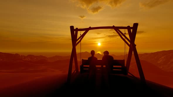 Young Couples Watching Sunset on a Swing