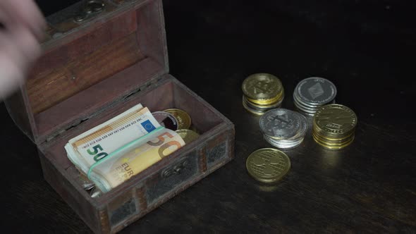 Bitcoin, Euro Banknotes and Golden Btc Coins on the Treasure Trove