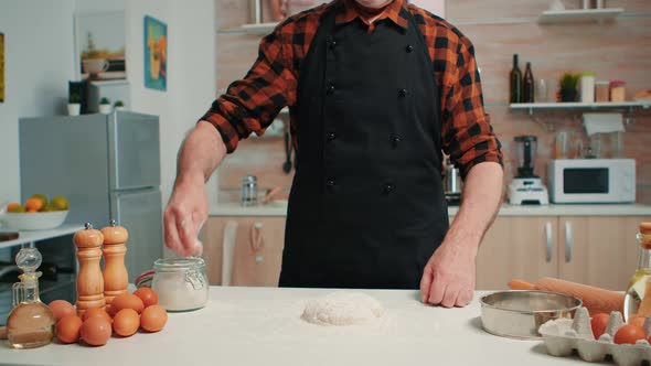 Bakery Man Sifting Flour Preparing Bread Dough