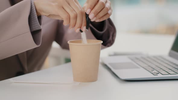 Closeup Female Hands Unrecognizable Woman Businesswoman Sitting in Office at Table with Laptop Pours