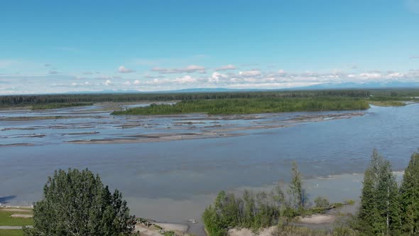 4K Drone Video of Susitna River with Snow Covered Mountain in Distance near Talkeetna, AK on Summer