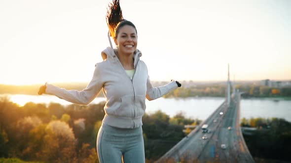 Sportswoman Using Jumping Rope to Stay Fit Outdoor