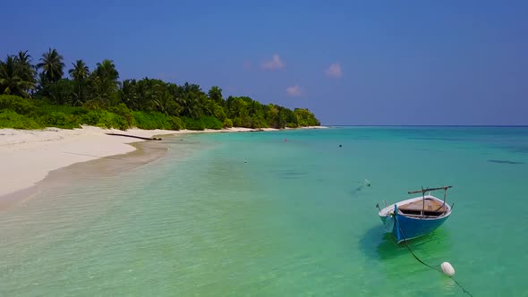 Aerial drone scenery of shore beach voyage by blue ocean and sand background