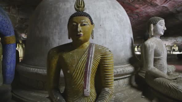 DAMBULLA, SRI LANKA - FEBRUARY 2014: Sitting Buddhas at the Golden Temple of Dambulla. The Golden Te
