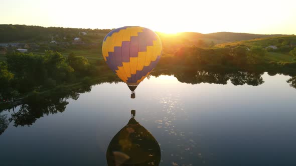 Balloon Over the Lake at Sunset