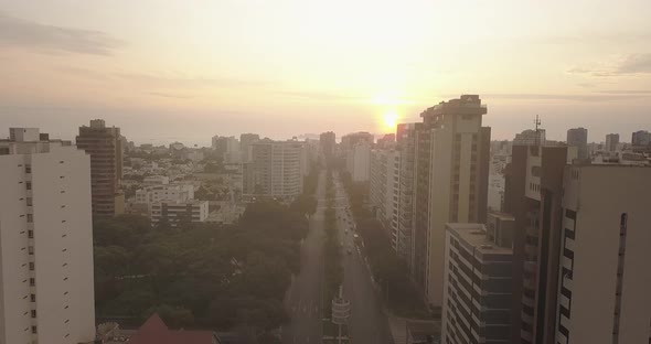 Drone shot of a calm an empty city at dusk