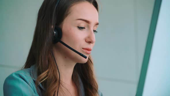 Business People Wearing Headset Working in Office