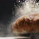 Fresh Rye Bread with White Flour Falls Down on Table Macro - VideoHive Item for Sale