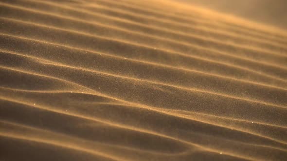 Slow Motion Shot of Desert Sand Dunes Ripples in the Wind