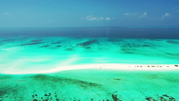 Aerial panorama of tropical resort beach journey by aqua blue sea with white sand background of adve