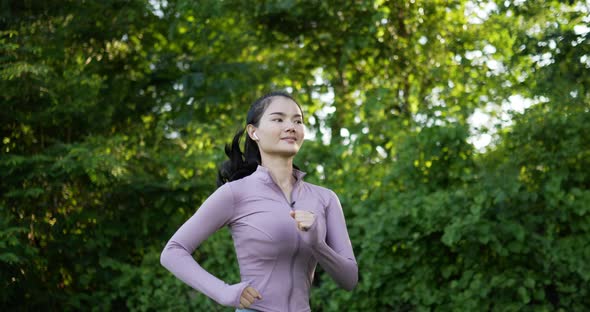 Asian young woman running