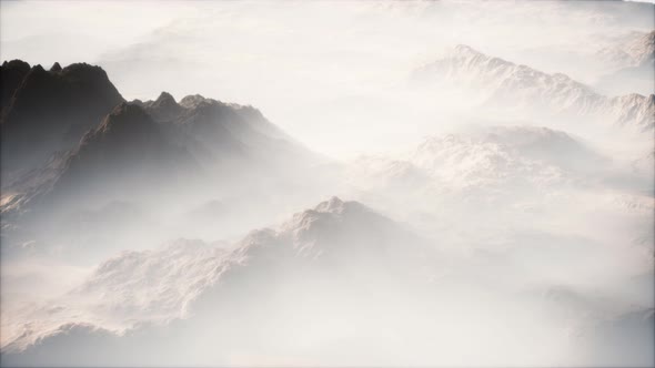 Distant Mountain Range and Thin Layer of Fog on the Valleys