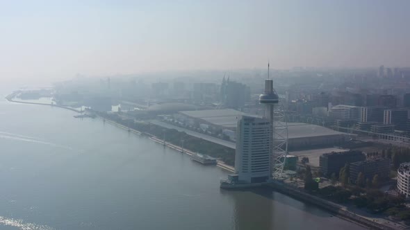 Aerial View of Lisbon and Vasco Da Gama Tower Early Morning with a Haze of Fog