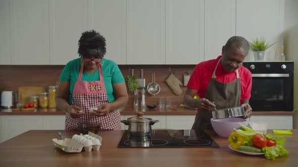 Elderly Black Family Preparing Homemade Dough