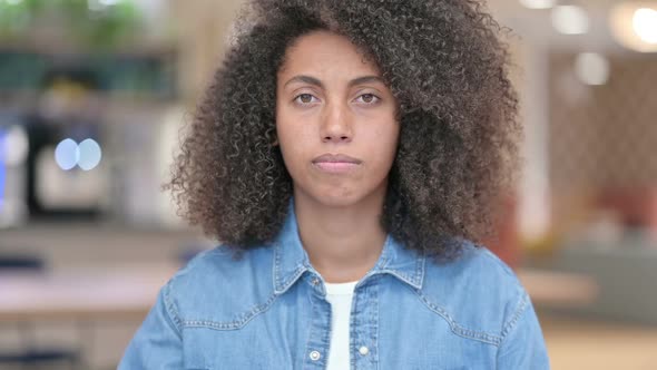 Excited Young Latin Woman Celebrating Success