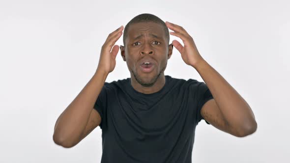 Disappointed Young African Man Reacting Loss on White Background