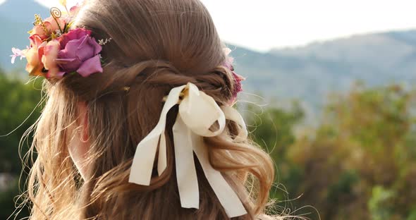 Ribbons in a flower girl's hair