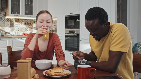 Biracial Couple Having Breakfast