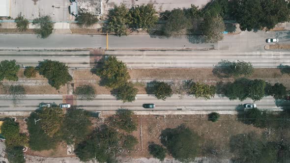 Landing view of avenue with railroad at the middle