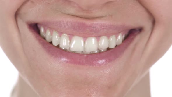 Close Up of Smiling Lips of Latin Girl White Teeth