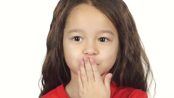 Close-up Girl Making Air Kiss at White Background. Slow Motion