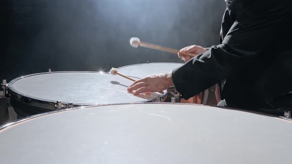 Musician Playing the Timpani