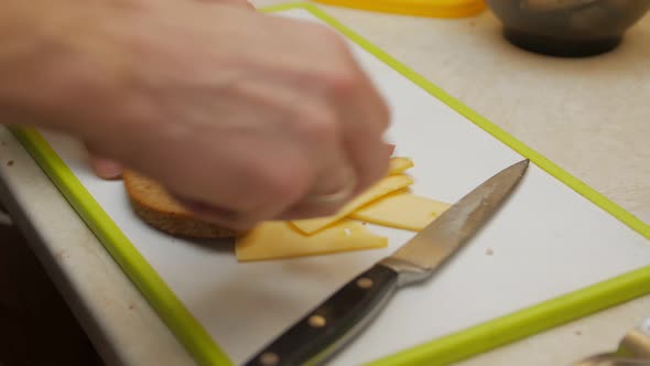 A Man Making A Sandwich