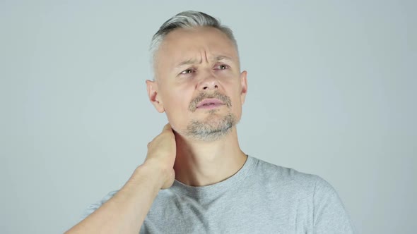 Neck Pain ,Man Suffering from Pain In Neck