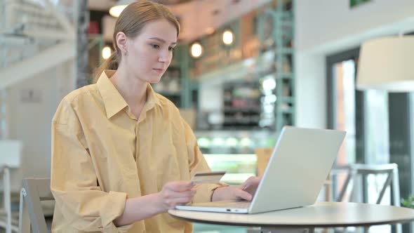 Online Payment Failure on Laptop By Young Woman