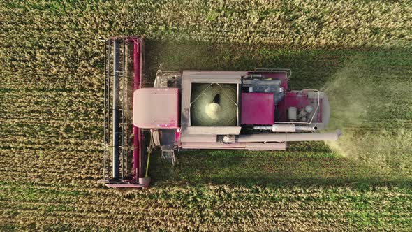 Aerial Combine Harvester with an Open Hopper