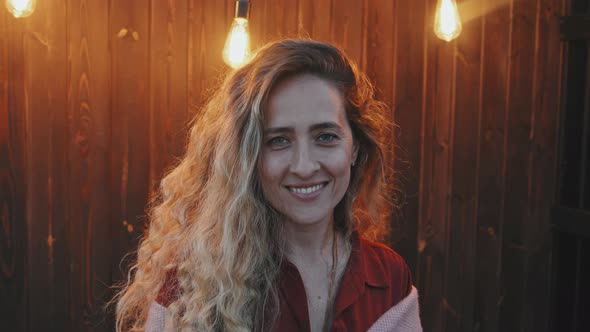 Woman Portrait in Light of Night Illumination