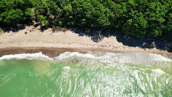 Spectacular Aerial drone video footage of beautiful Lake Erie during summer on a sunny day