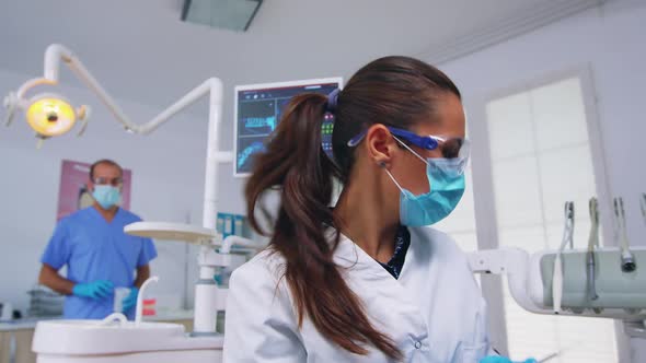 Patient Pov to Doctor in Stomatological Office Treating Teeth