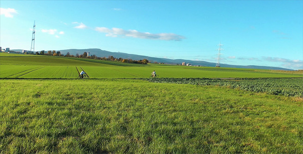 Landscape And People On Bike