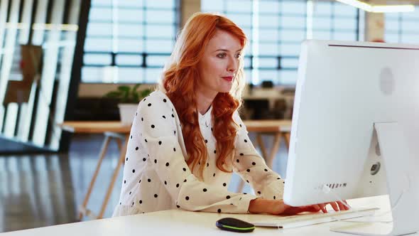 Businesswoman Working on Computer