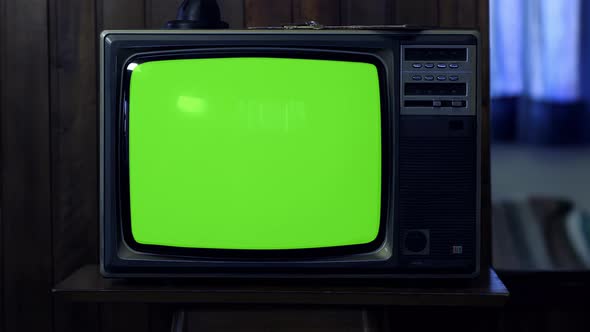 Retro TV turning on Color Bars and Green Screen at Night. 4K Version.