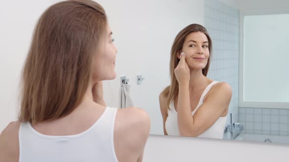 Woman Cleaning Face