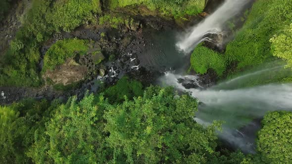 Aerial View of Waterfall in Green Rainforest