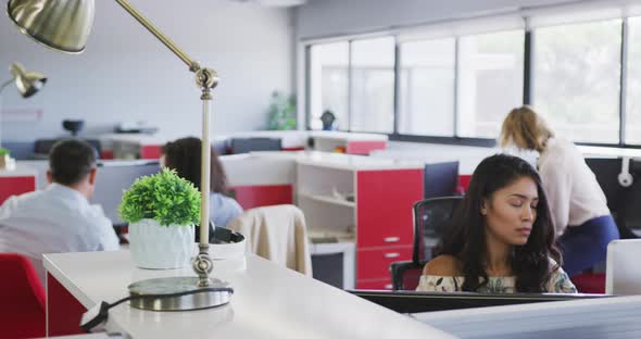 Professional businesspeople working in modern office in slow motion