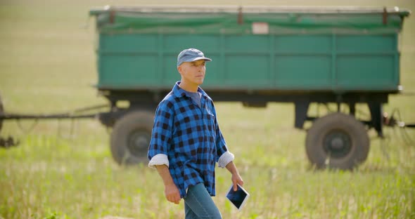 Farmer Using Digital Tablet Agriculture