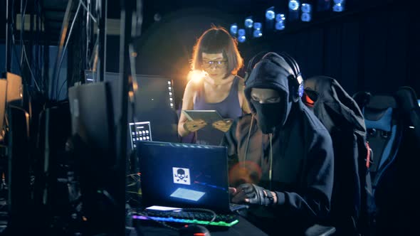 Fraudsters Hacking Computers Together. Cyber Attack Concept.