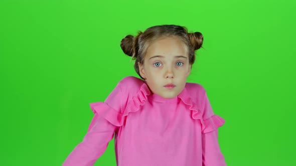 Child Is Surprised From What He Saw. Green Screen. Slow Motion