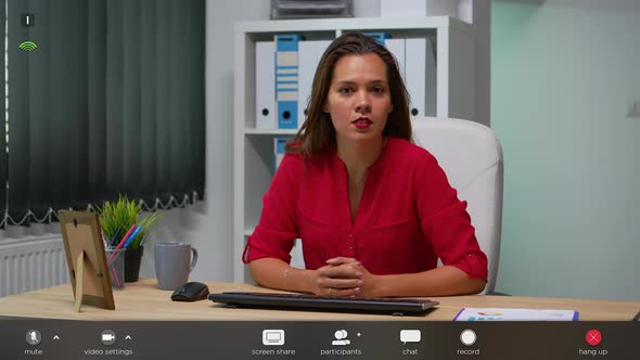 Business Woman Talking in Front of Camera During Video Call