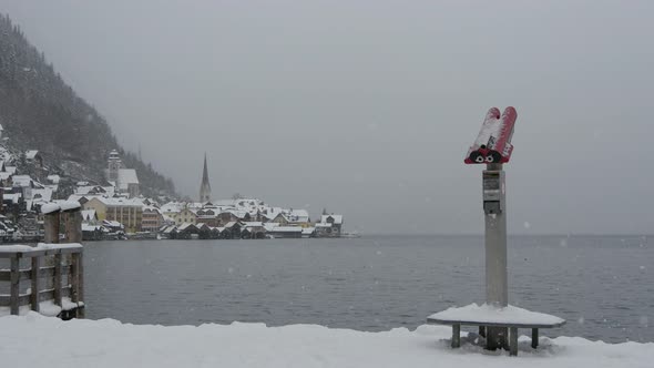 The shore of Hallstatter See during snowfall