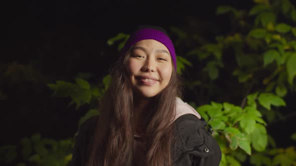 Portrait of Pretty Asian Woman Hiker in Bobble Hat