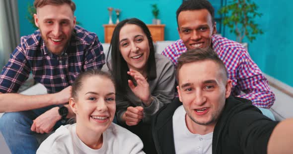 At Home Diverse Group of Friends Doing Collective Video Stream Guy Lifts Camera