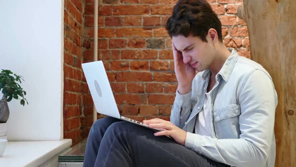 Headache Frustrated Man with Stress Working on Laptop