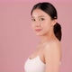 Slow motion of Beautiful Asian girl looking at camera on pink background - VideoHive Item for Sale